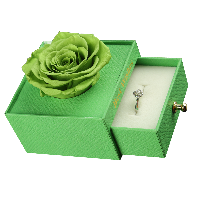 preserved green rose in green box